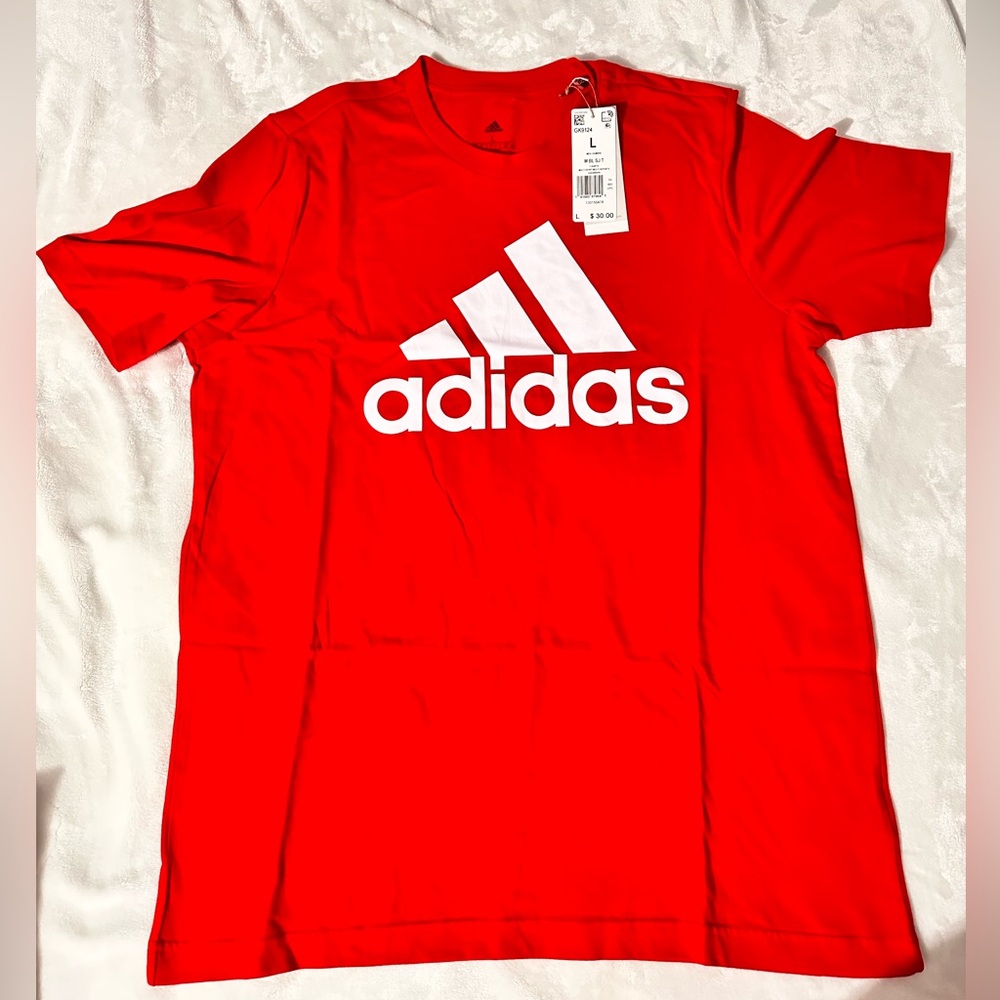 Adidas big center logo 
Condition new with tags
Size L